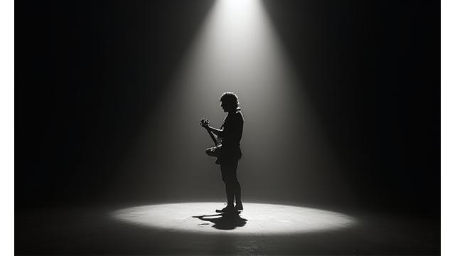 A spotlight beam illuminating a single, emerging artist on a conceptual stage, representing talent discovery.
